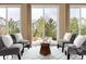 Cozy sitting area with four chairs and outdoor fire pit view at 27235 E Lakeview Pl, Aurora, CO 80016