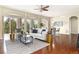 Bright living room featuring large windows and hardwood floors at 27235 E Lakeview Pl, Aurora, CO 80016