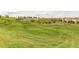 Expansive community park with playground equipment and open space at 9571 Yucca Ct, Arvada, CO 80007