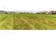 Vast open space with lush lawn in neighborhood at 9571 Yucca Ct, Arvada, CO 80007