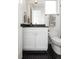Contemporary bathroom featuring a vanity, modern fixtures, and hexagon tile flooring at 2012 W 46Th Ave, Denver, CO 80211