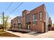 Beautiful brick townhomes featuring modern architectural design and inviting entrances at 2012 W 46Th Ave, Denver, CO 80211
