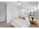 Clean bedroom with white walls, neutral accents, and modern design elements, offering a serene atmosphere at 2830 W 32Nd Ave, Denver, CO 80211