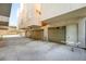 A row of individual garages for townhomes, each with a door to the residence and overhead door at 2830 W 32Nd Ave, Denver, CO 80211