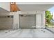 Individual garages for townhomes, each with a door to the residence and overhead door at 2830 W 32Nd Ave, Denver, CO 80211