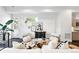 Bright living room with modern furnishings, open layout, and stylish decor at 2830 W 32Nd Ave, Denver, CO 80211