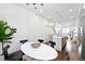 Bright living area featuring an open floor plan, modern kitchen, and stylish design at 2830 W 32Nd Ave, Denver, CO 80211