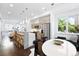 Open living space with a modern kitchen, dining area, and stainless steel appliances at 2830 W 32Nd Ave, Denver, CO 80211