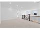 Bonus room/loft area featuring neutral carpeting, recessed lighting, and a decorative railing at 5625 W 141 Ln, Broomfield, CO 80020