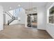 Bright and open living space with stylish lighting, high ceilings and wood floors at 5625 W 141 Ln, Broomfield, CO 80020
