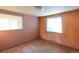 Bedroom featuring hardwood floors and two windows for great natural light at 1996 S Linden Ct, Denver, CO 80224