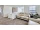 Inviting upstairs living room with comfortable seating and bright natural light at 17402 W 93Rd Pl, Arvada, CO 80007