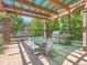 Outdoor kitchen featuring a built in BBQ, steel cabinets, and outdoor table and chairs at 1401 Delgany St # 409, Denver, CO 80202