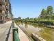Community river walk, with views of the water, parks, and surrounding buildings at 1401 Delgany St # 409, Denver, CO 80202