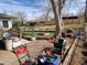 Backyard with outdoor furniture, garden tools, and potential for landscaping at 12116 W Texas Dr, Lakewood, CO 80228