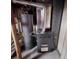 Goodman furnace and water heater in basement utility area at 12116 W Texas Dr, Lakewood, CO 80228