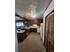 A kitchen with wood cabinets, stainless steel appliances, and a light colored floor at 12116 W Texas Dr, Lakewood, CO 80228