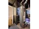 Basement utility area with water heater at 12116 W Texas Dr, Lakewood, CO 80228