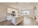 Modern kitchen with granite countertops, stainless appliances, and a center island with pendant lighting at 6993 Ipswich Ct, Castle Pines, CO 80108