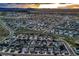 Panoramic aerial shot of a large residential community nestled amidst rolling hills and scenic landscapes at 5256 Trails Edge Ln, Castle Rock, CO 80104