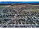 Expansive aerial view of a well-planned community, showcasing the layout and surrounding landscape at 5256 Trails Edge Ln, Castle Rock, CO 80104