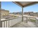 Inviting front porch and neighborhood street view at 5256 Trails Edge Ln, Castle Rock, CO 80104