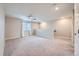 Carpeted loft area with natural light, ceiling fan, and plenty of open space at 5256 Trails Edge Ln, Castle Rock, CO 80104