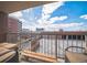 Relaxing outdoor balcony featuring seating and city views at 1301 Speer Blvd # 309, Denver, CO 80204
