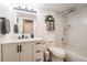 Clean and modern bathroom with white subway tile shower and stylish vanity at 1301 Speer Blvd # 309, Denver, CO 80204