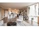 Inviting living space open to the kitchen, featuring modern furnishings and natural light at 1301 Speer Blvd # 309, Denver, CO 80204