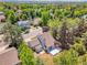Aerial view of property featuring mature trees, professional landscaping, and neighborhood views at 655 Gooseberry Ct, Lafayette, CO 80026