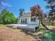 Enjoy the spacious backyard deck perfect for entertaining with lawn space and shade trees at 655 Gooseberry Ct, Lafayette, CO 80026