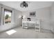 This bedroom features a unique loft bed with a desk and window, creating a cozy and functional space at 655 Gooseberry Ct, Lafayette, CO 80026