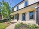 Charming home exterior with inviting front porch, manicured lawn, and attractive landscaping at 655 Gooseberry Ct, Lafayette, CO 80026