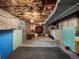 Unfinished basement with exposed ceiling, concrete walls, and a drumset at 10978 Roseanna Dr, Northglenn, CO 80234