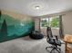 Bright bedroom features large window with beautiful mountain mural at 10978 Roseanna Dr, Northglenn, CO 80234