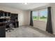 Bedroom with desk space and windows with natural light at 10978 Roseanna Dr, Northglenn, CO 80234