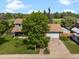 Charming two-story home with a well-maintained lawn and mature trees at 10978 Roseanna Dr, Northglenn, CO 80234