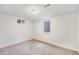 Finished basement bedroom with new carpet and neutral paint at 2280 Sherrelwood Dr, Denver, CO 80221