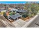 Aerial view showing the property, detached garage, and fenced backyard at 3383 S Ogden St, Englewood, CO 80113