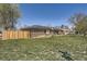 Expansive backyard with a new wooden fence, perfect for outdoor activities and entertaining guests at 3383 S Ogden St, Englewood, CO 80113