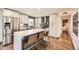 Stylish kitchen with a large center island, stainless steel appliances, and modern cabinetry at 3383 S Ogden St, Englewood, CO 80113