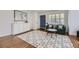 Inviting living room with stylish decor, a patterned rug, and seating for comfortable relaxation at 3383 S Ogden St, Englewood, CO 80113