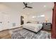 Spacious main bedroom with ample natural light, a comfortable bed, and stylish decor at 3383 S Ogden St, Englewood, CO 80113