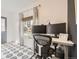 Bright office with a large window and a modern desk setup perfect for a productive work environment at 3383 S Ogden St, Englewood, CO 80113