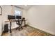 Home office with a large window providing natural light, perfect for a productive workspace at 3383 S Ogden St, Englewood, CO 80113