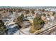 Aerial view of home and surrounding neighborhood in winter at 8871 E Amherst Dr # A, Denver, CO 80231