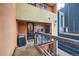 Private balcony with seating area and outdoor grill, perfect for relaxing outdoors at 801 Confidence Dr # 16, Longmont, CO 80504