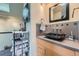 Modern bathroom featuring a stone vessel sink, sleek hardware, and minimalist decor at 801 Confidence Dr # 16, Longmont, CO 80504