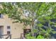 A modern townhouse complex showcasing colorful exterior paint, front doors, balconies, and dark framed windows at 801 Confidence Dr # 16, Longmont, CO 80504